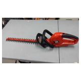 Black and Decker electric 22" hedge trimmer.