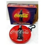 Coca-Cola blinking disc telephone.