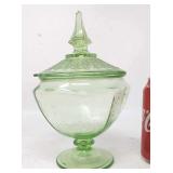 Green depression glass covered candy dish.