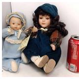 2 porcelain doll music boxes. Schmid moves.