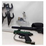 2 Paint ball guns with quick loaders. Not tested.