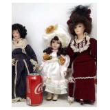 3 Porcelain dolls.