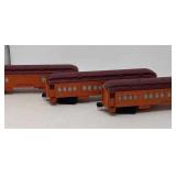 3 Lionel train cars. Approximately 13" long.