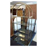 Metal frame with 5 glass shelves.