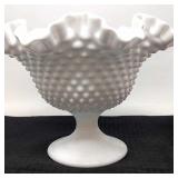 White milk glass ruffled edge hobnail dish.