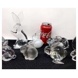 9 Crystal rabbits, paperweights, candle holder.