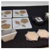 Assorted coasters and trivets/wall hangings,