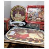 Coca-Cola trays, placemats, tins, trivets.