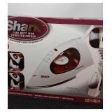 Shark 1400 watt cord/cordless iron, appears new.