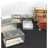 8 jewelry/trinket boxes. One is a music box,