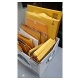 Box lot of office supplies, mailers, adding