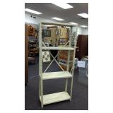 4 shelf metal rack. Approximately 12"x30"x72".