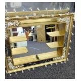 2 matching hanging mirrors with shelves has a