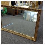 Large framed hanging mirror. Approximately