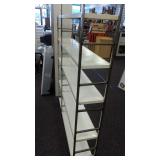 Metal shelving unit. Approximately 9"x52"x72".