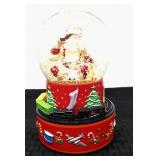 Coca-Cola Santa musical snow globe with train.