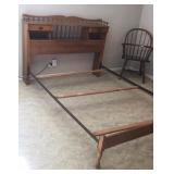 Maple bed with bookshelf style headboard. Appears