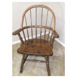 Colonial style wood chair with curved back and