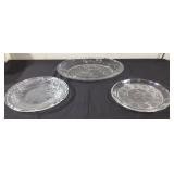 Three glass platters.