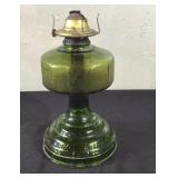 Green oil lamp without the chimney.