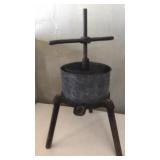 Fruit press with the wooden legs