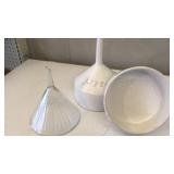 Two porcelain funnel strainers