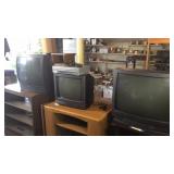 Three televisions and one VCR