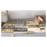 Large lot of license plates.