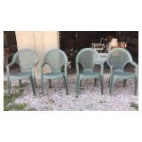 4 Plastic yard chairs. One is broken. See photos.