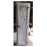 Vintage white kitchen cabinet with metal shelves,