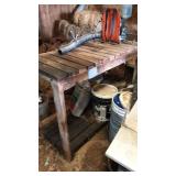 57 Inch wood framed homemade potting bench.