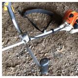 Stihl FS90 string trimmer including shoulder strap