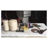 Twine, garden sprinkler, wrenches, hammer, misc.