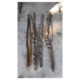 Seven homemade walking sticks,