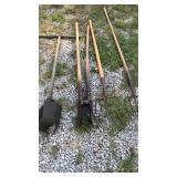 One post hole digger, one job or, two pitchforks