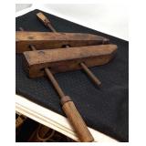 Antique wooden clamp.