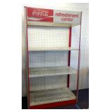 Coca-Cola metal rack. Adjustable shelves.