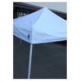 E-Z up instant shelter. Approximately 10'x10'.