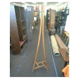 Oak coat rack. Approximately 68" tall.