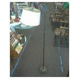 Antique floor lamp.  Cast iron base.