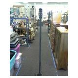 Iron base floor lamp.  Working when tested.