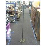 Antique cast iron base floor lamp.