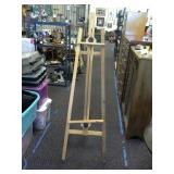 Fredrix Wooden easel. Approximately 65" tall.