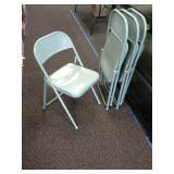 4 Metal folding chairs.