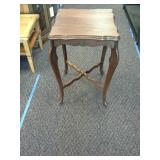 Antique wooden flower table.