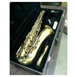 Monique alto saxophone in padded case. Extra