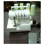 Simplicity serger model SL 350 and accessories.