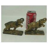 2 cast iron elephant bookends. Painted gold.