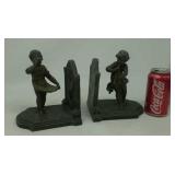 Antique metal, non magnetic,  bookends.  Made in