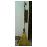 Decorative broom with 2 brooms. Approximately 56'